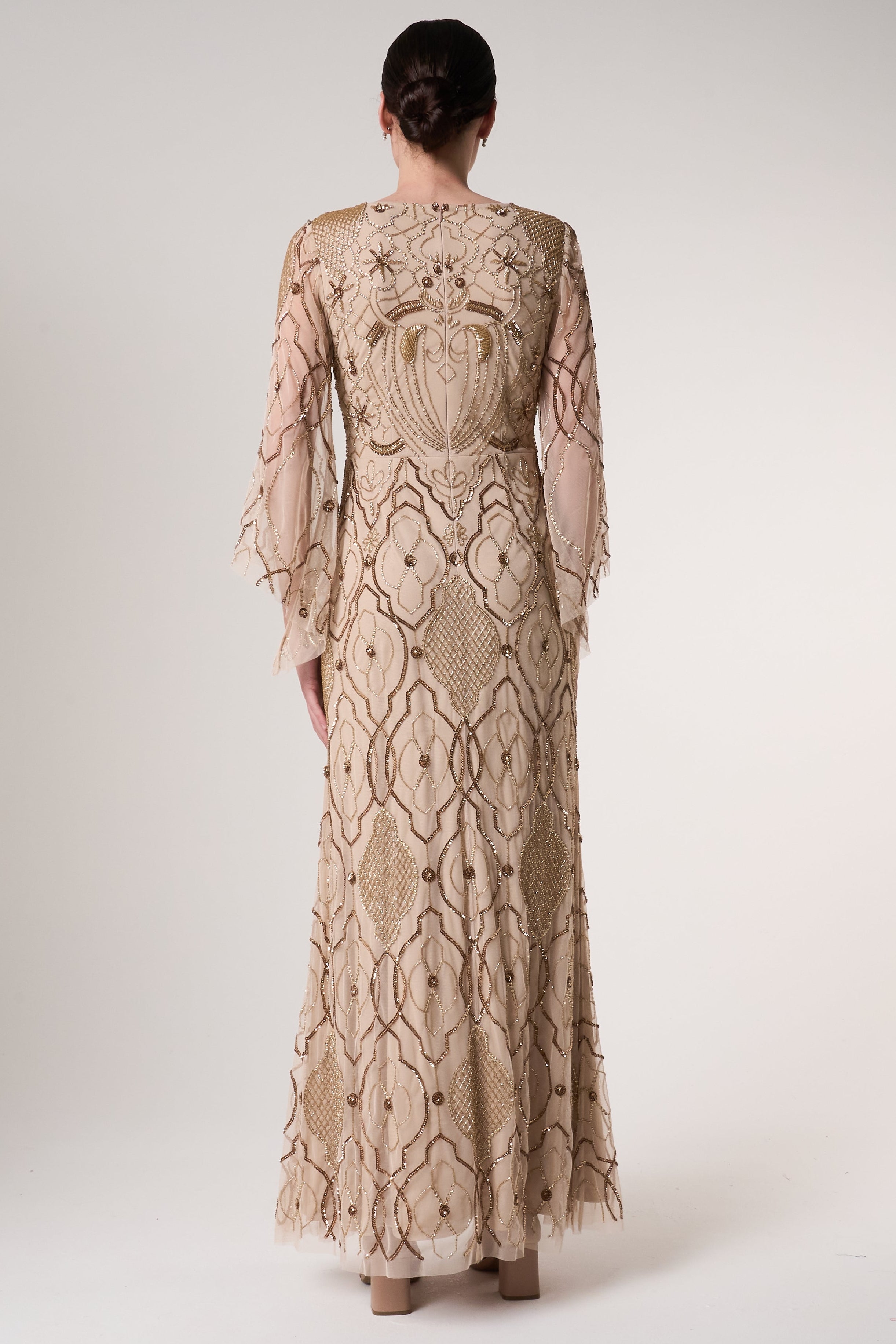 Faith gold embellished maxi dress with intricate beadwork and sheer long sleeves