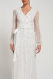 Grace white embellished maxi dress with tonal leaf detailing, faux wrap silhouette and long sleeves designed for elegant bridal and occasion wear styling