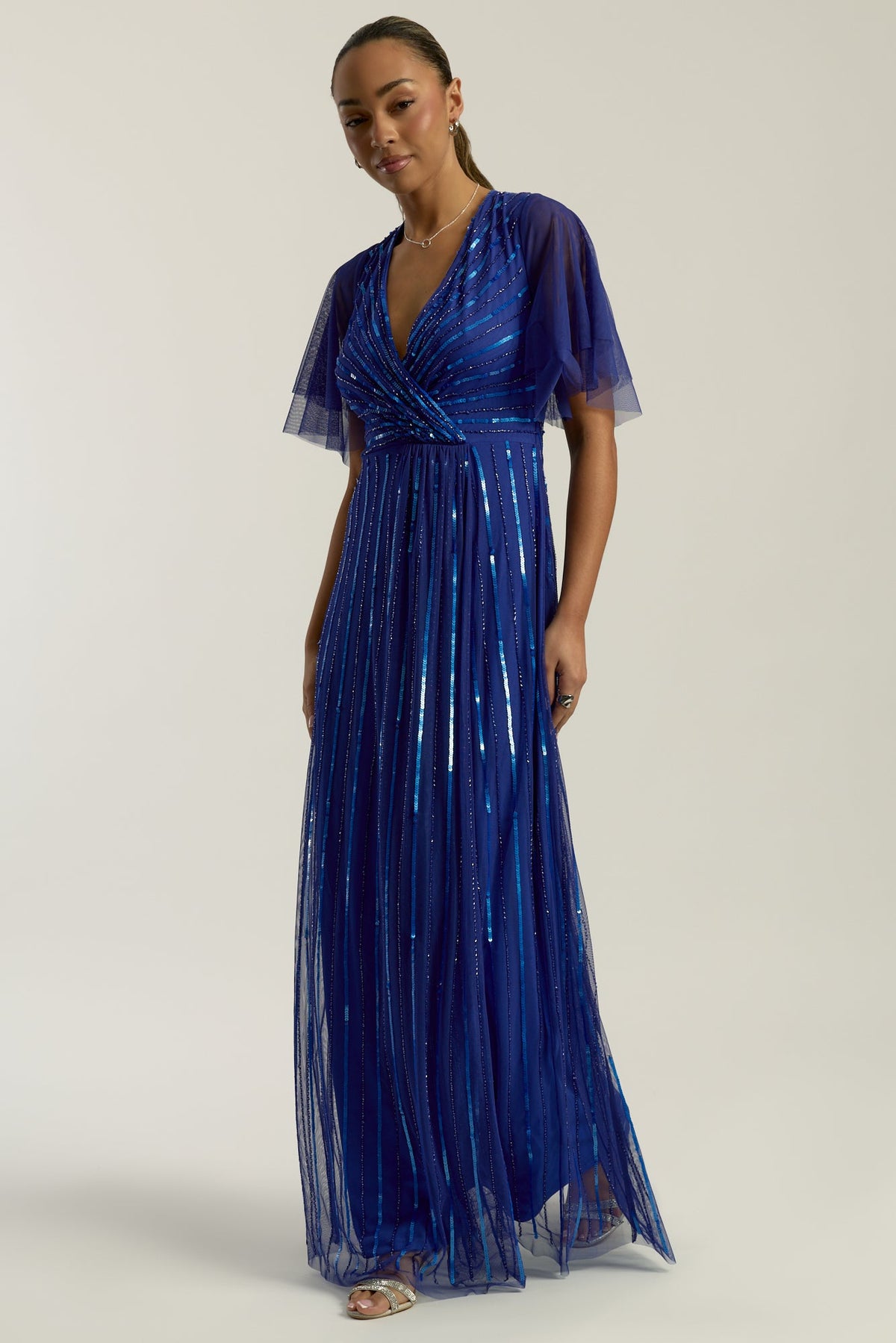 Harper Electric Blue Sequin Maxi Dress with v-neckline and full-length silhouette, perfect for weddings, balls, formal occasions and bridesmaids.