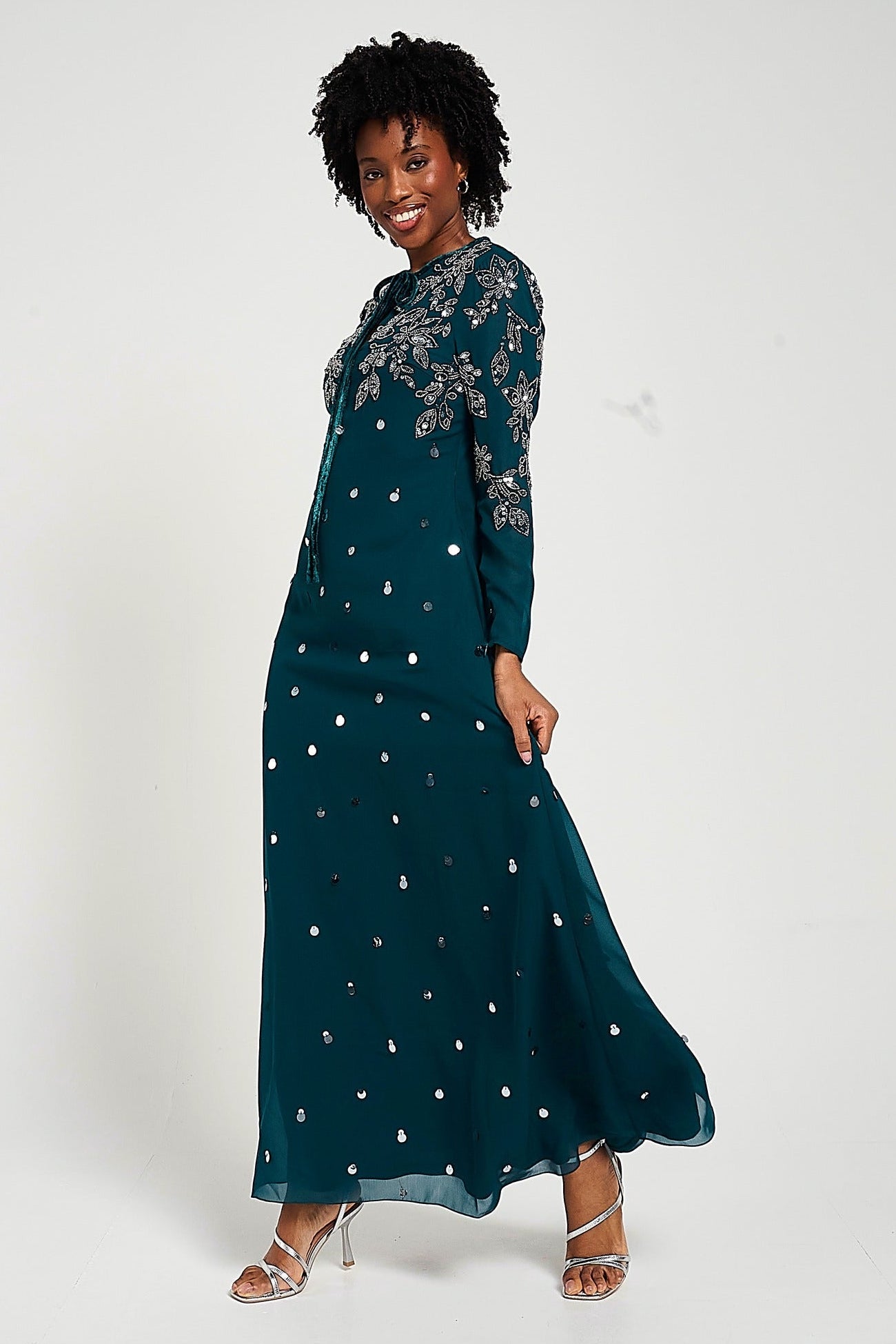 Helena Storm Green Embellished Maxi Dress by Frock and Frill, long sleeve modest evening gown with full-length skirt and sparkling embellishments.