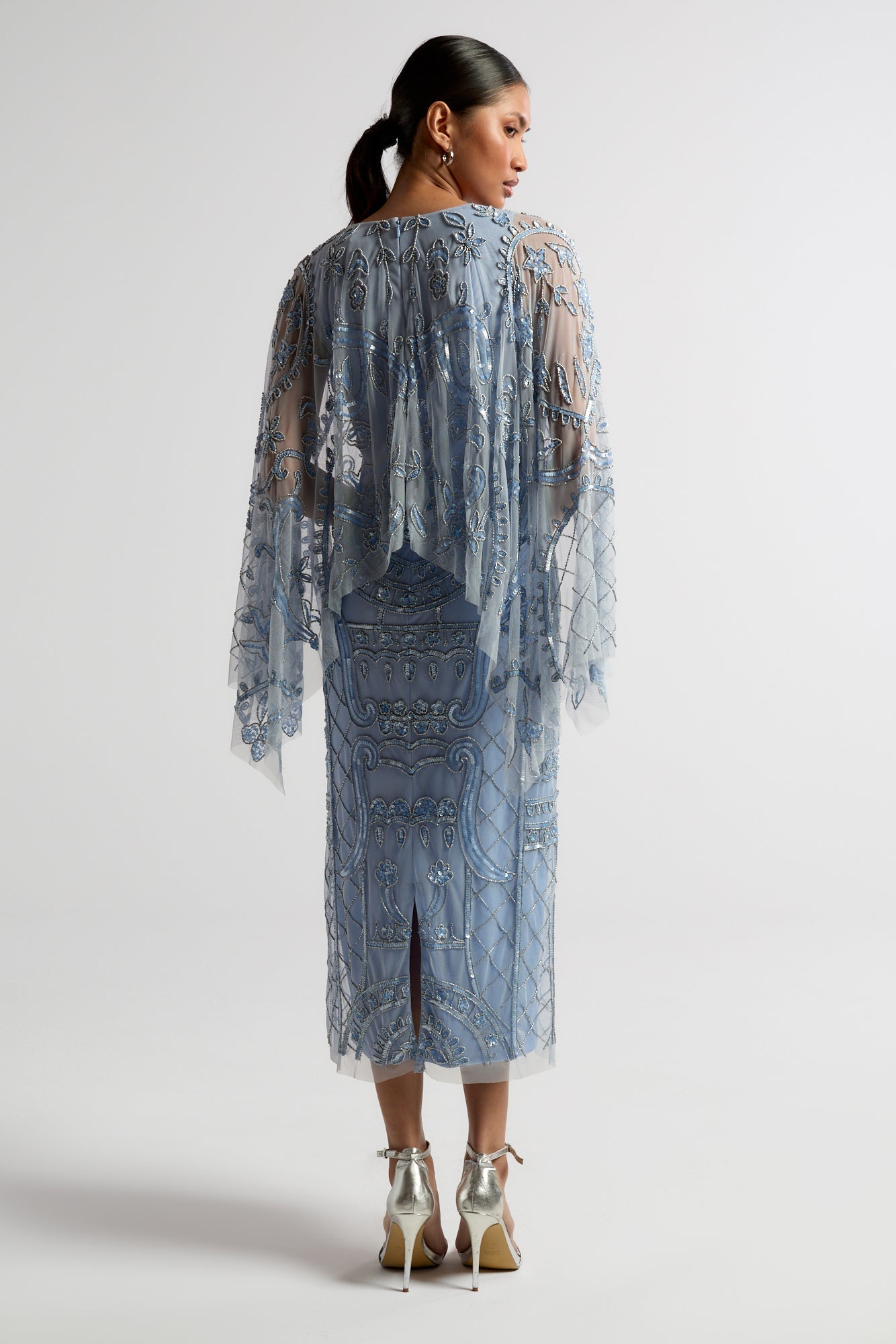 Juliana Blue Embellished Midi Dress With Cape Detail by Frock and Frill in cornflower blue with all-over beading and flowing cape overlay.