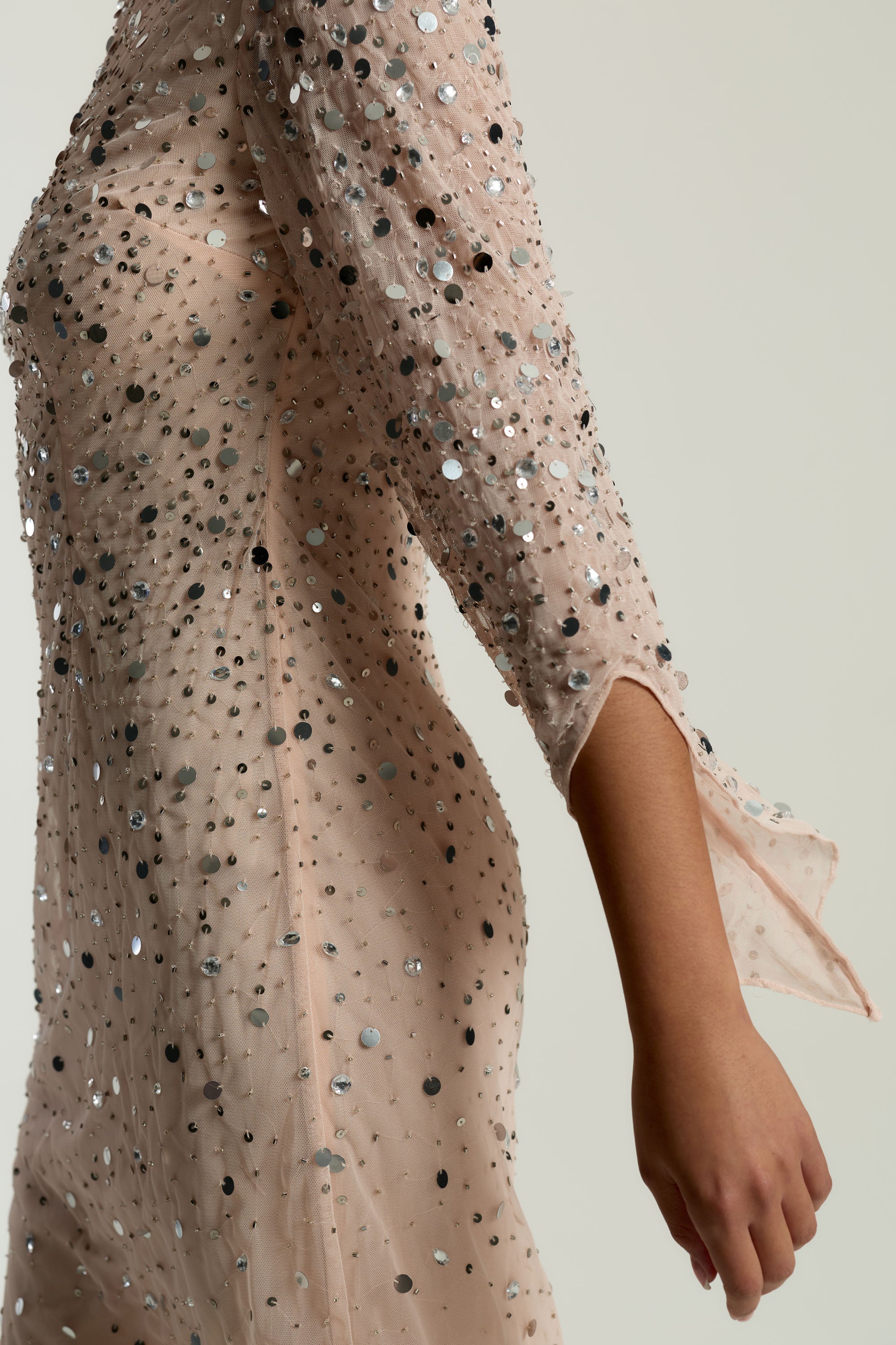 Leah blush sequin midi dress with high neckline, three-quarter sleeves and all-over sparkle designed for elegant evening and occasion wear styling