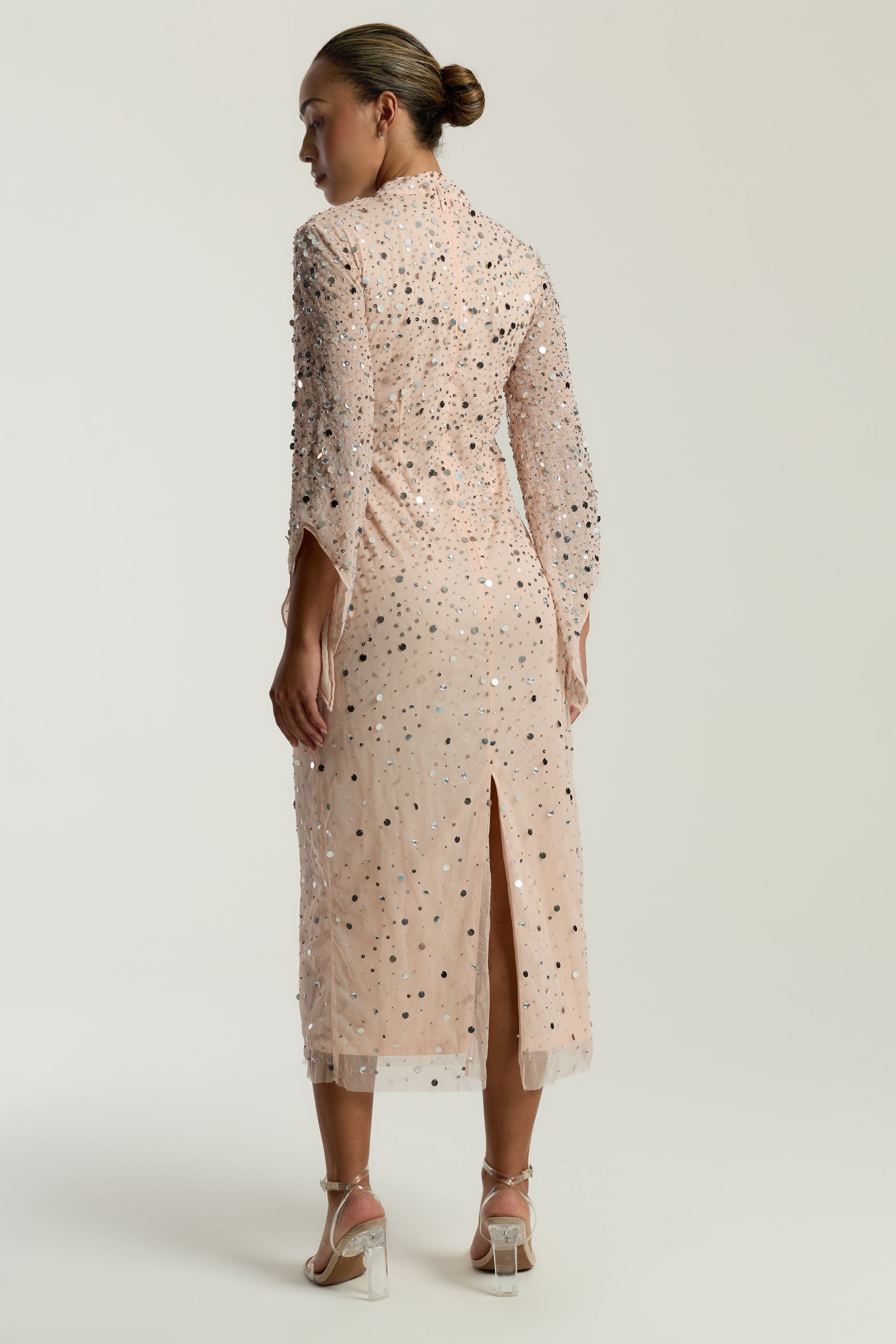 Leah blush sequin midi dress with high neckline, three-quarter sleeves and all-over sparkle designed for elegant evening and occasion wear styling