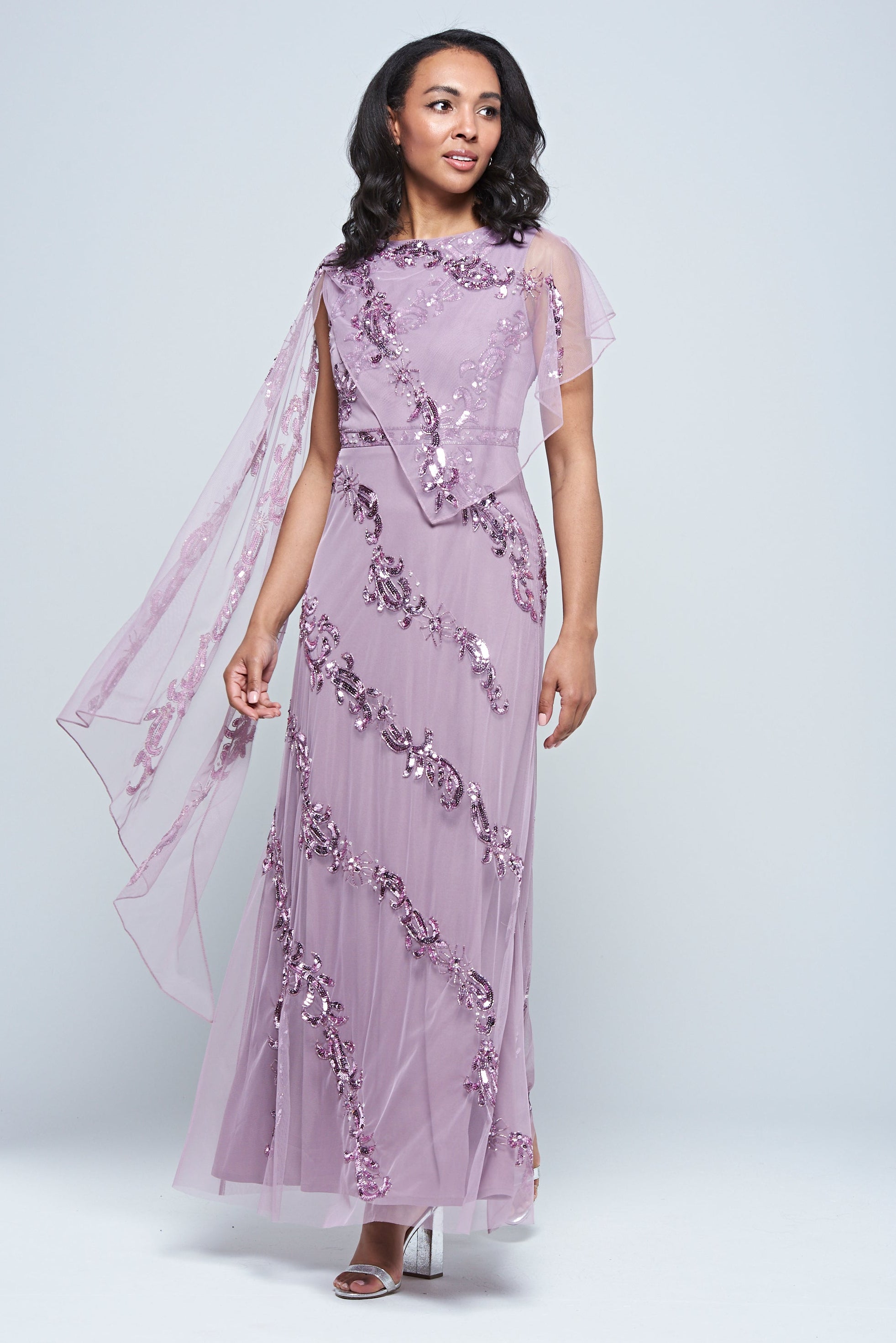Lilla Lilac Embellished Asymmetric Cape Sleeve Maxi Dress by Frock and Frill, perfect for spring weddings and special occasions. 