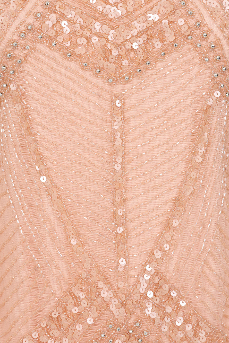 Liora blush embellished midi dress with intricate beading and sheer long sleeves. Perfect for parties and elegant evening occasions.