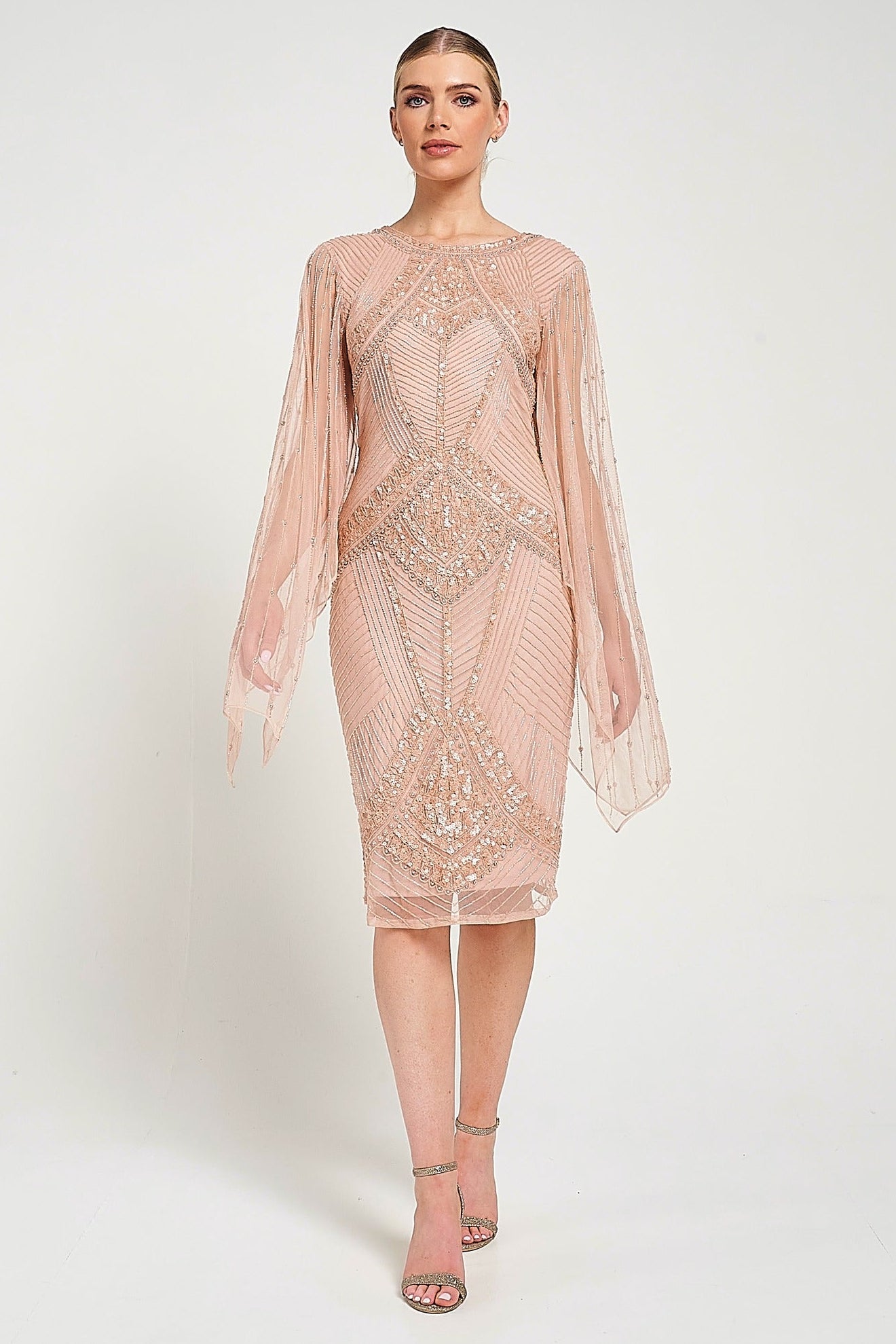 Liora blush embellished midi dress with intricate beading and sheer long sleeves. Perfect for parties and elegant evening occasions.