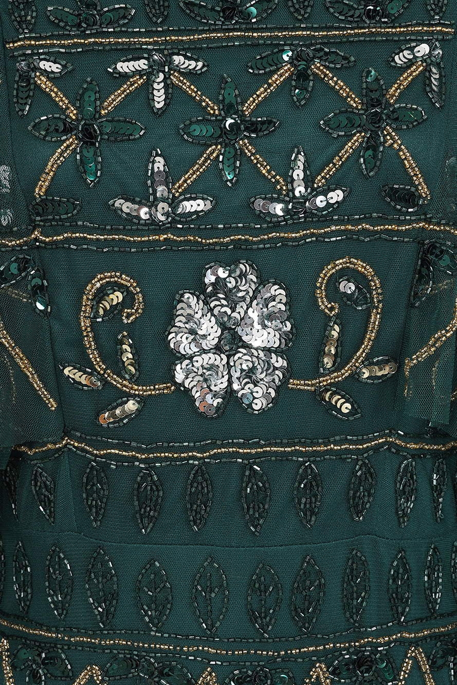 Mahonia by Frock and Frill green embellished midaxi dress with cape sleeves. 