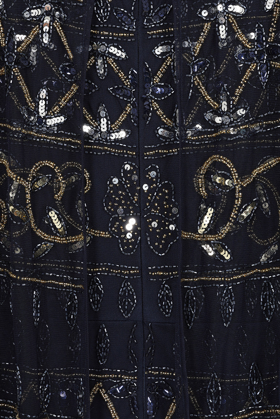 Navy Mahonia cape sleeve midaxi dress from Frock and Frill, fully embellished with sparkling beads, featuring a flowing skirt, perfect for weddings, parties, and modest evening occasions