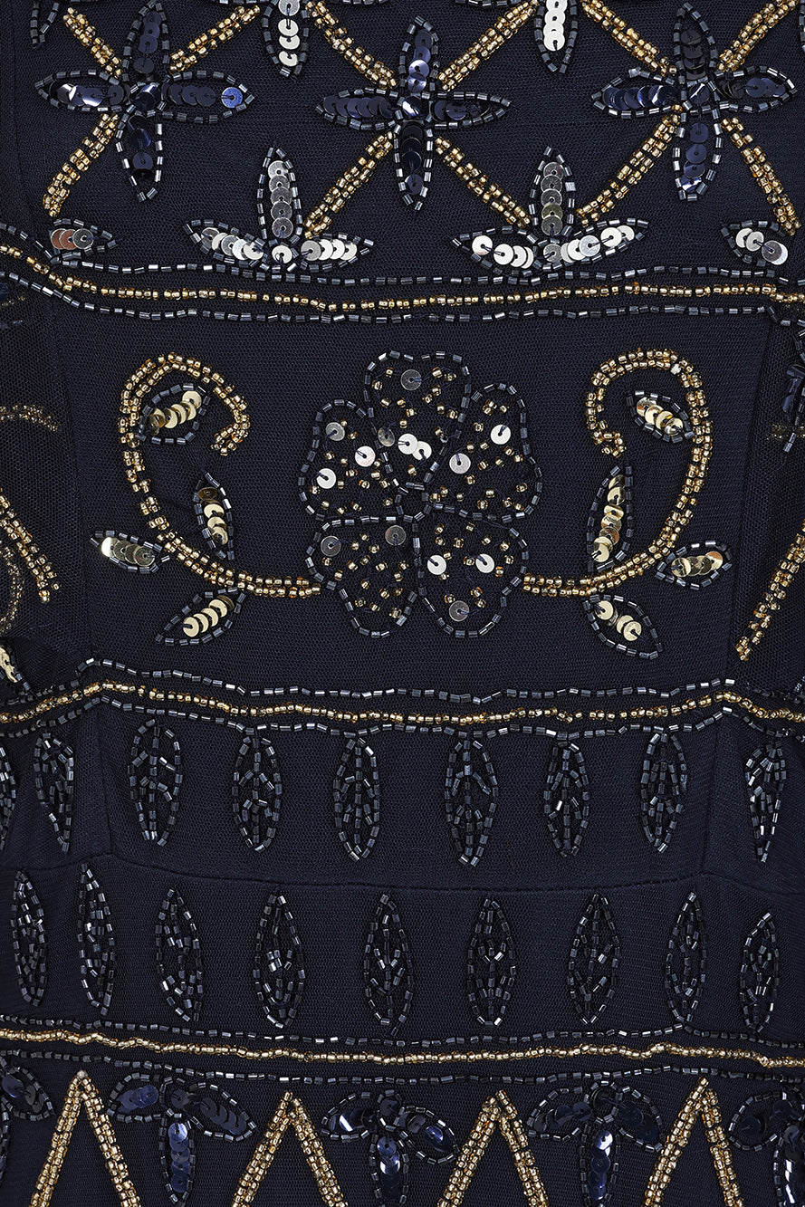 Navy Mahonia cape sleeve midaxi dress from Frock and Frill, fully embellished with sparkling beads, featuring a flowing skirt, perfect for weddings, parties, and modest evening occasions