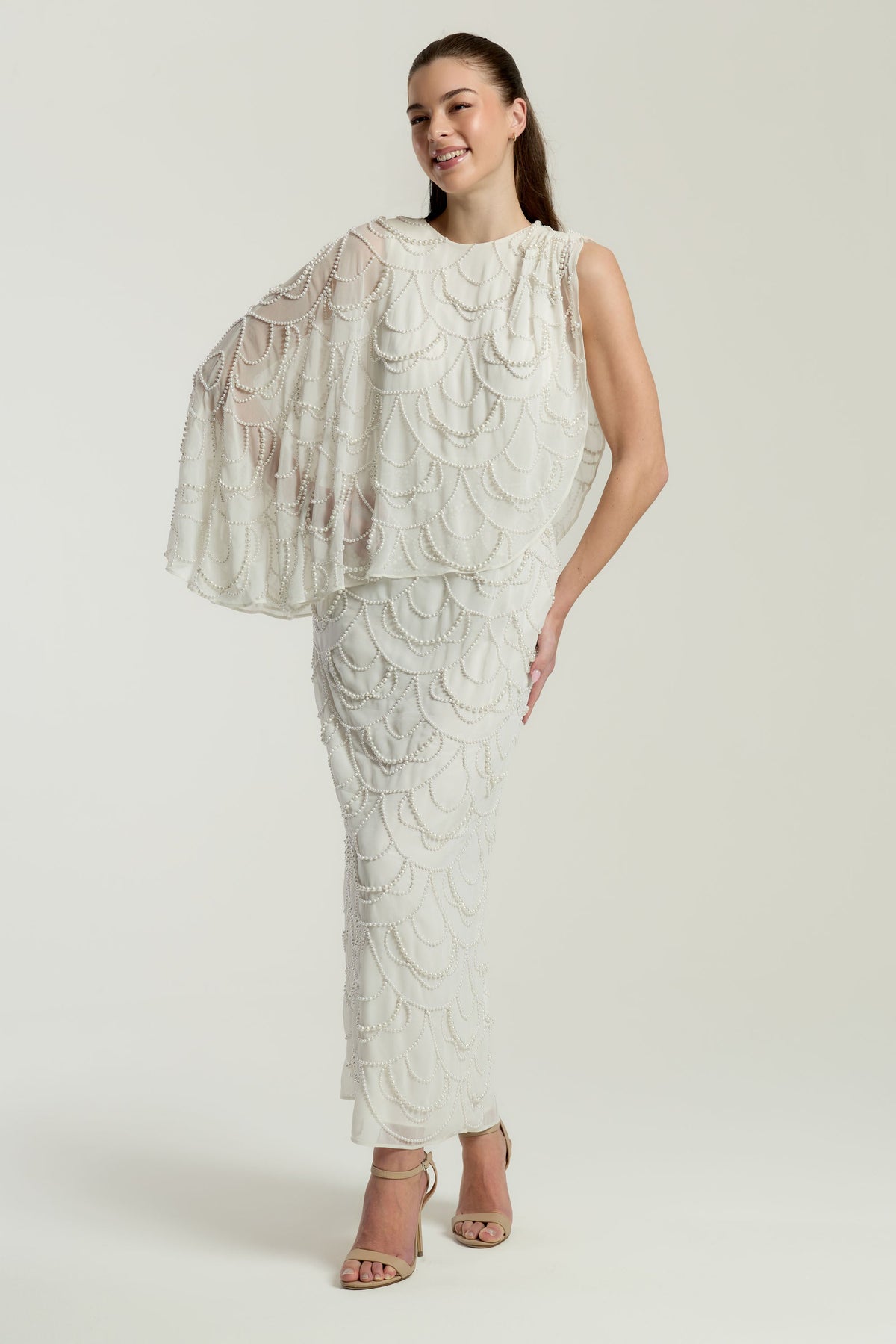 Neva White Embellished Asymmetric Cape Sleeve Maxi Dress – midaxi-length wedding or formal evening gown with flowing cape overlay and delicate embellishments