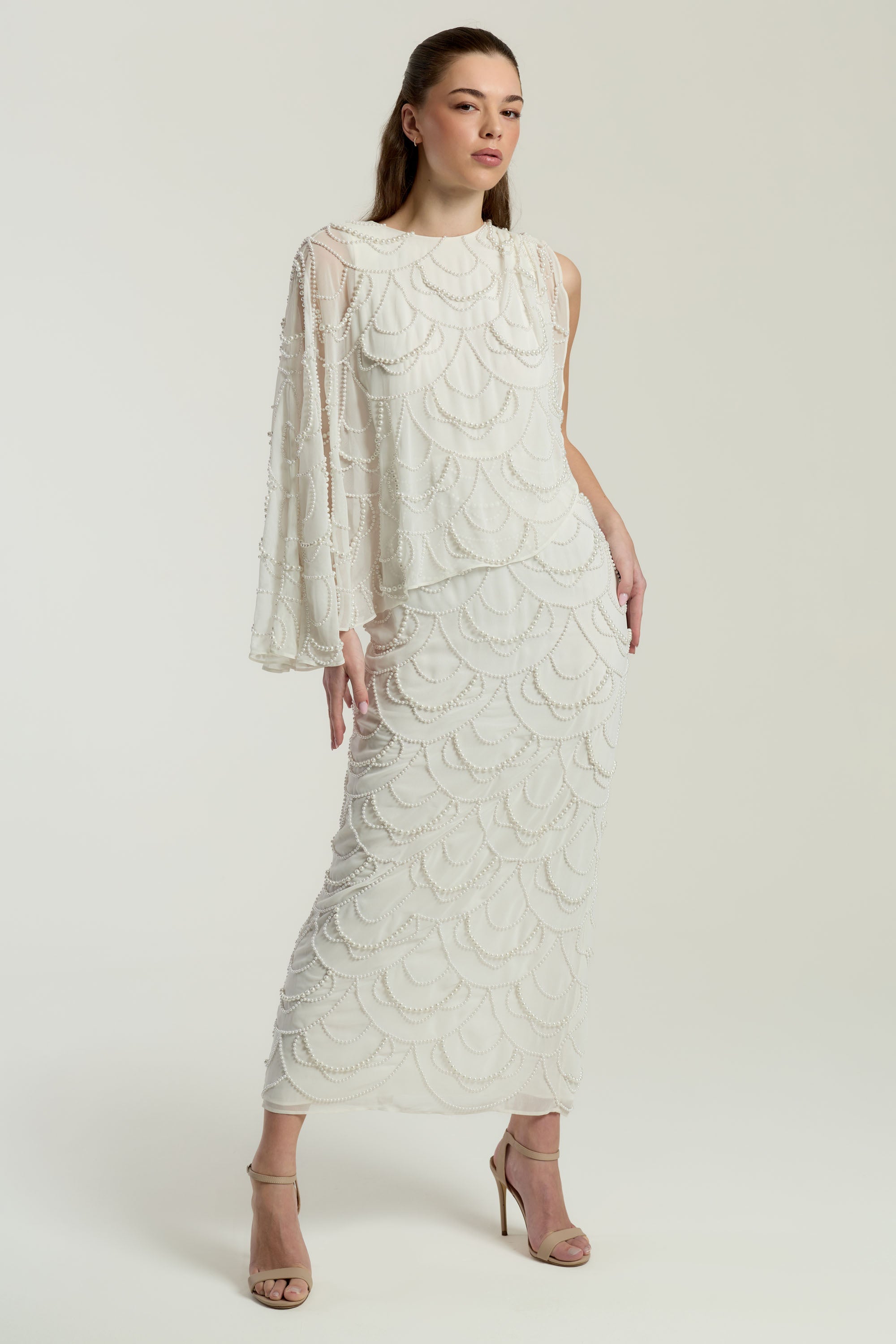 Neva White Embellished Asymmetric Cape Sleeve Maxi Dress – midaxi-length wedding or formal evening gown with flowing cape overlay and delicate embellishments