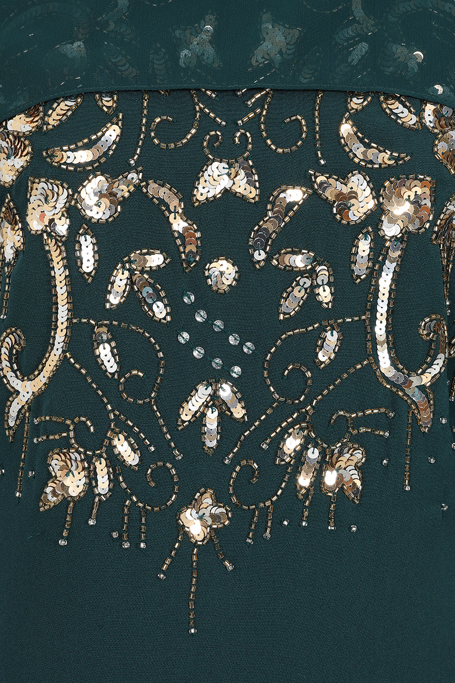 Frock and Frill Paloma Embellished Maxi Dress with cape detail, long sleeves, and flowing silhouette in rainforest green, perfect for weddings and evening events.