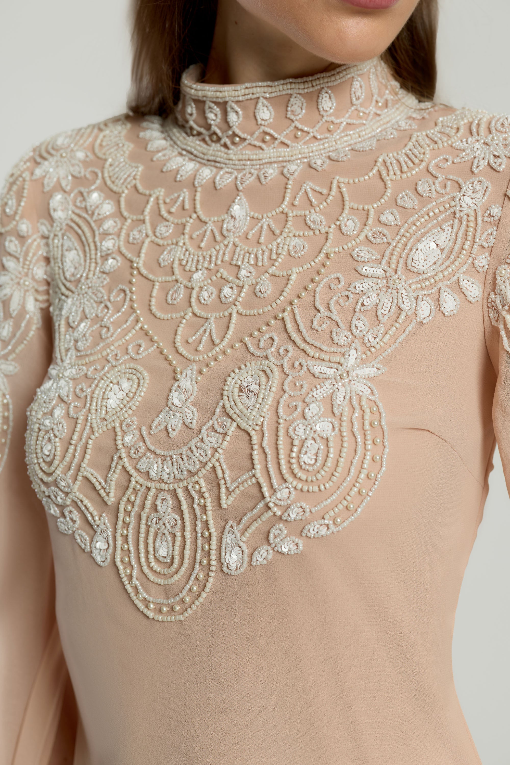 Penelope blush cape maxi dress with white embellishments on bodice and cape sleeves, modest formal dress for weddings and spring occasions