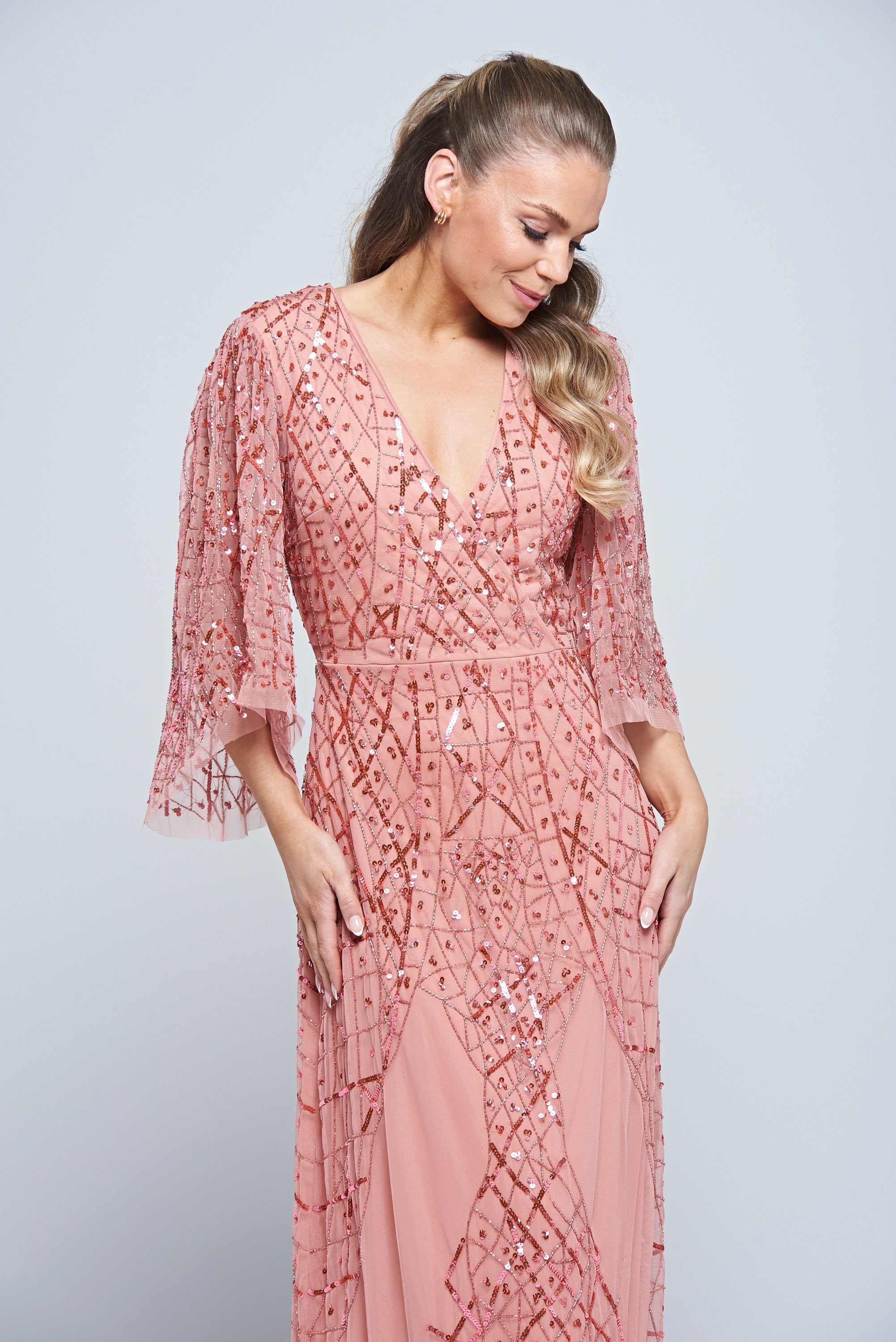Rosalina pink embellished maxi dress with flowing silhouette and shimmering sequin detail, perfect for weddings, parties and special occasions.