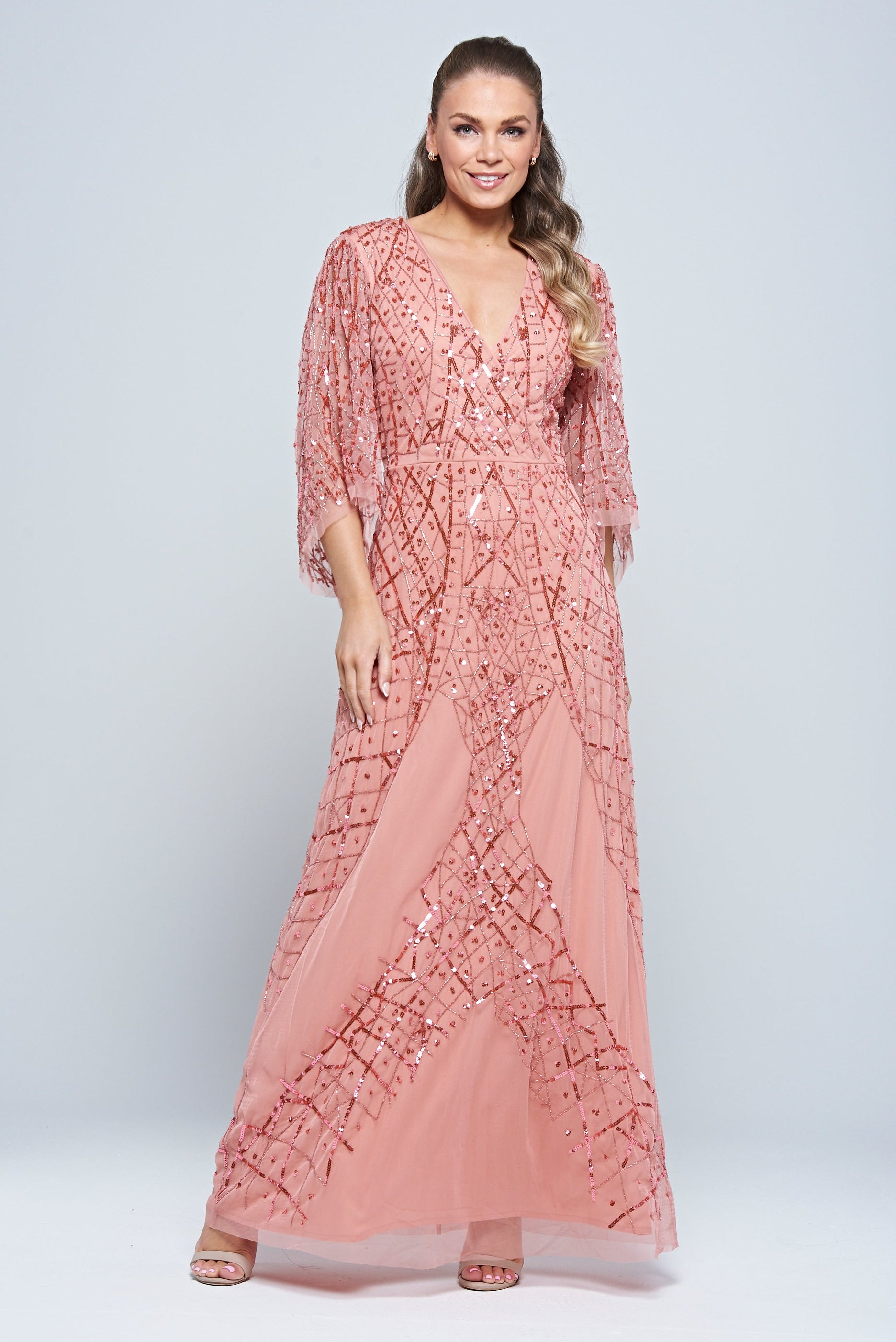 Rosalina pink embellished maxi dress with flowing silhouette and shimmering sequin detail, perfect for weddings, parties and special occasions.