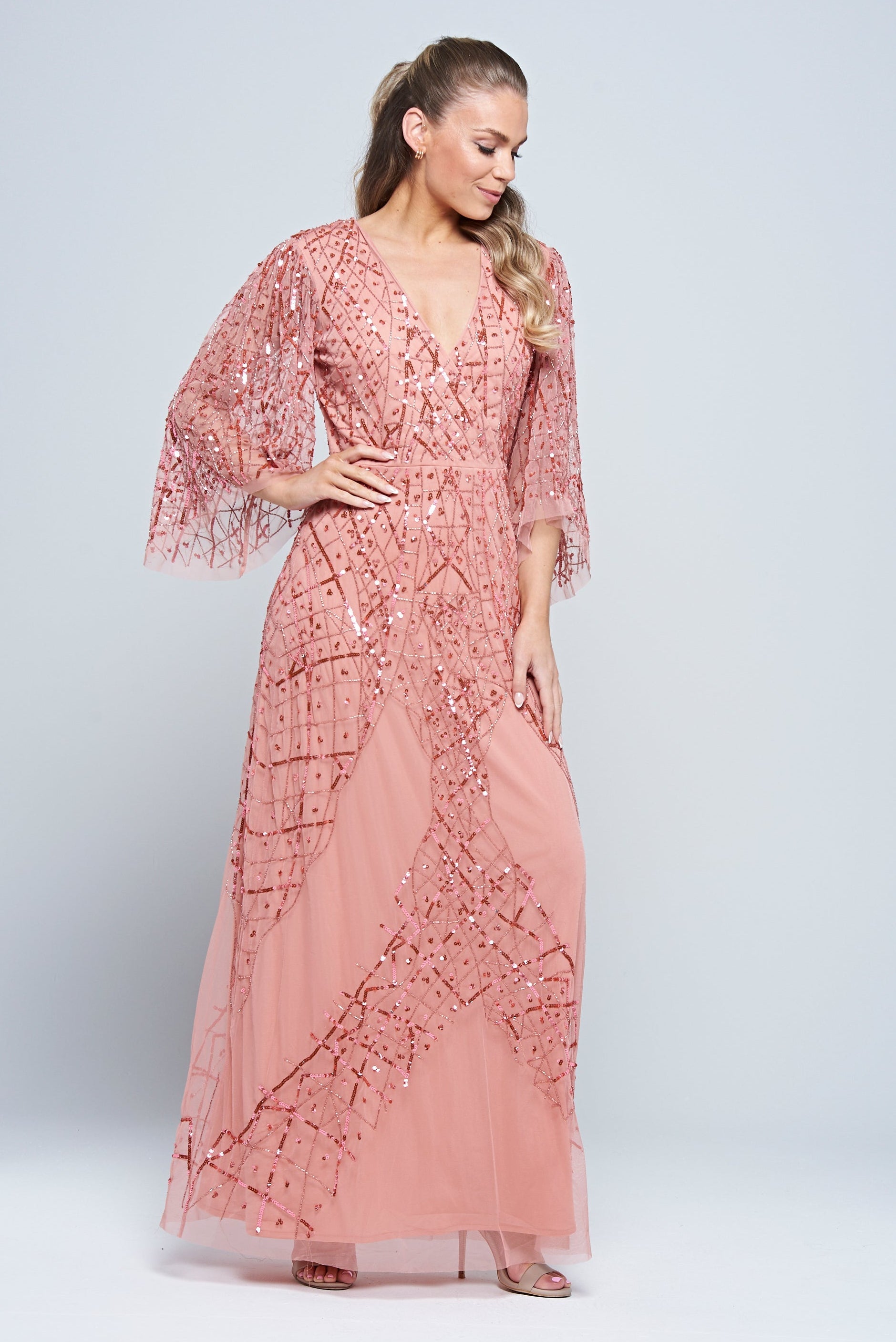 Rosalina pink embellished maxi dress with flowing silhouette and shimmering sequin detail, perfect for weddings, parties and special occasions.