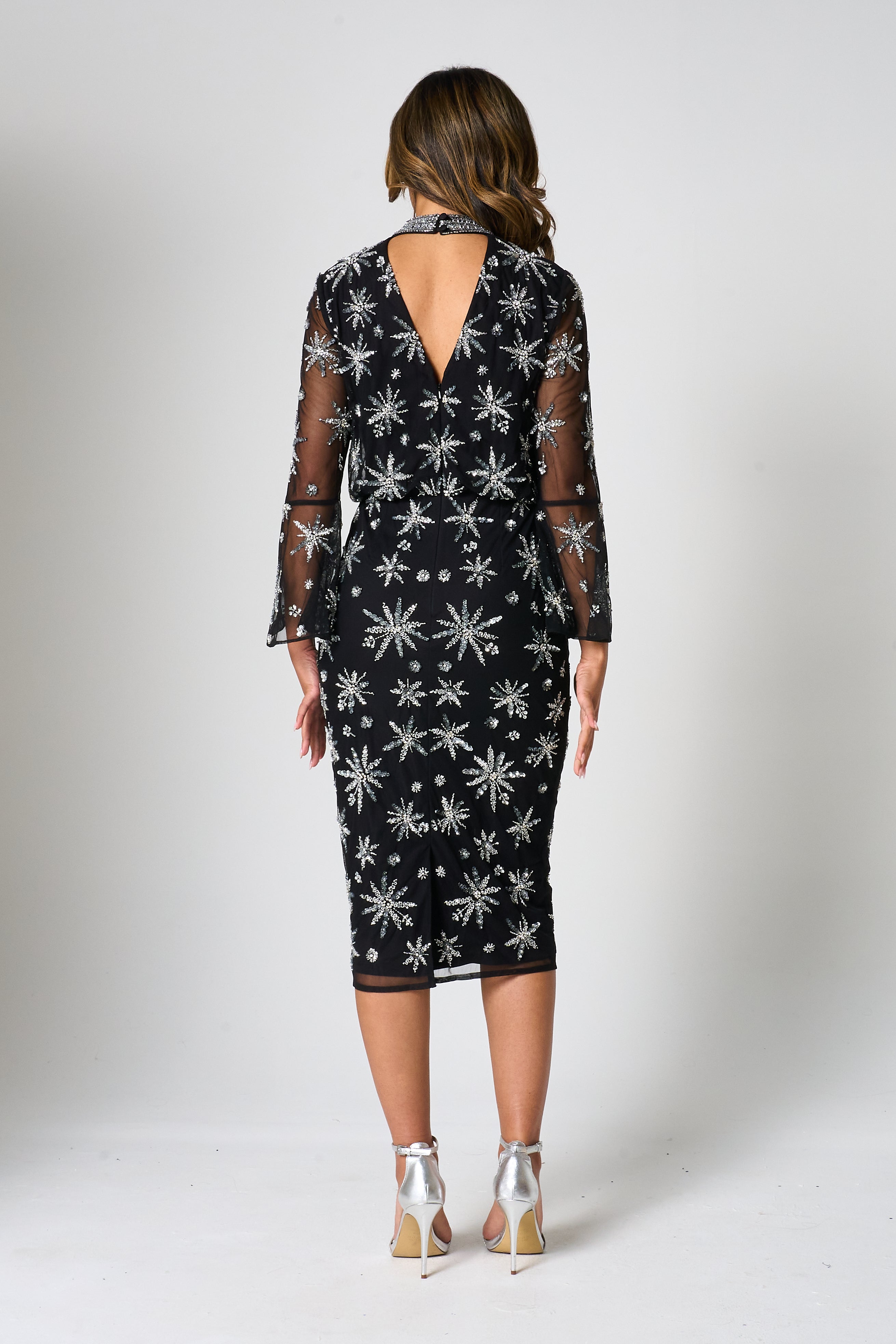 Roxanna black embellished midi dress by Frock and Frill with star bead detailing and sheer long sleeves