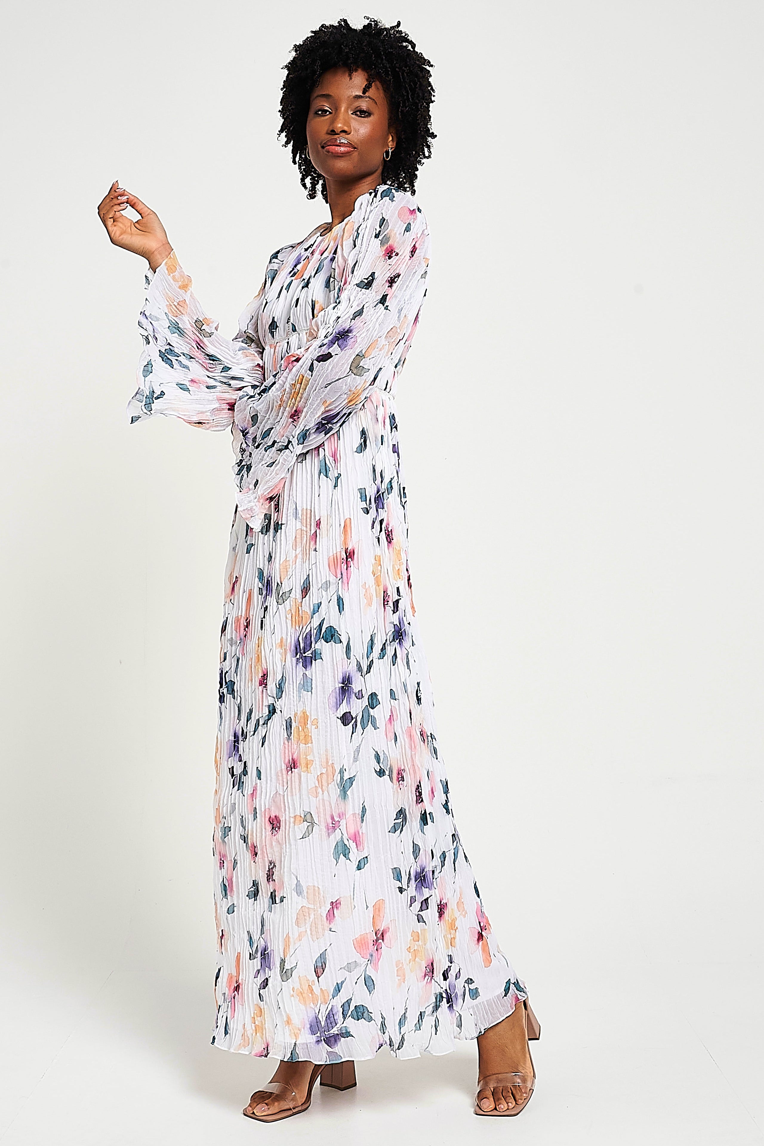 Serena white floral print maxi dress by Frock and Frill with long sleeves and full-length silhouette designed for elegant modest occasion and day wear styling