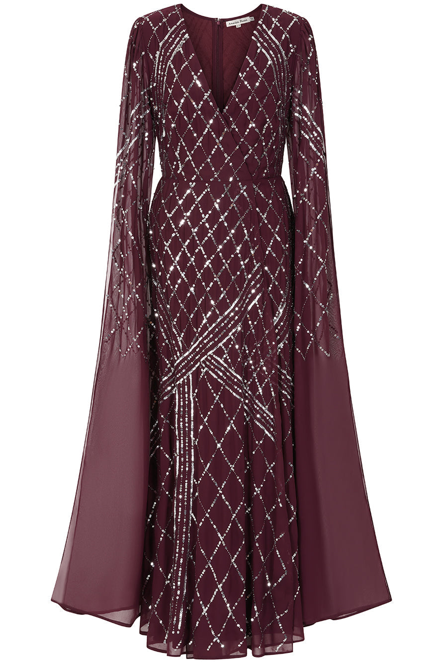 Simone fig sequin cape sleeve maxi dress with plunging V neckline, silver criss-cross sequin detailing and flowing full-length silhouette for statement occasion wear styling