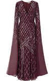 Simone fig sequin cape sleeve maxi dress with plunging V neckline, silver criss-cross sequin detailing and flowing full-length silhouette for statement occasion wear styling