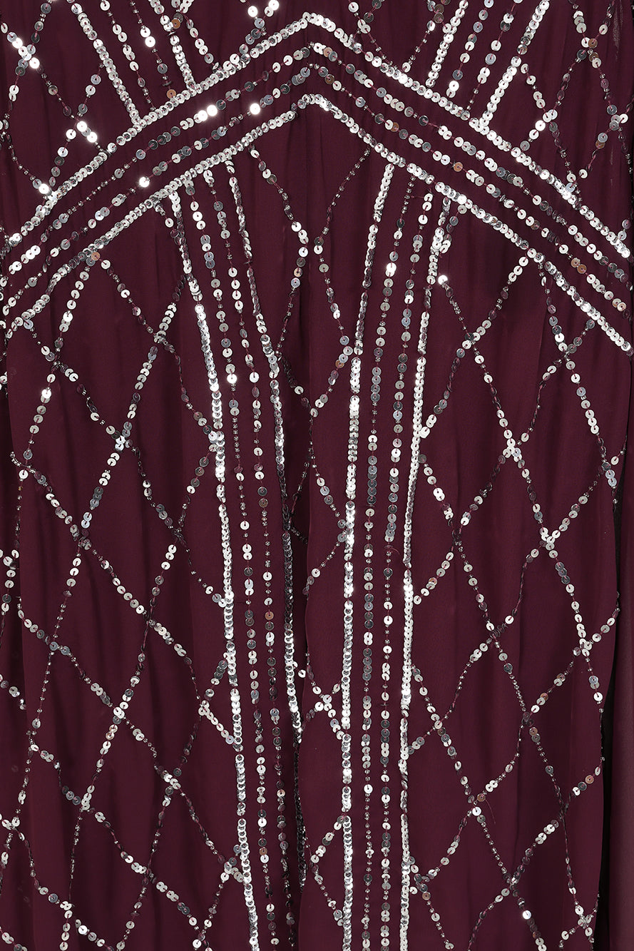 Simone fig sequin cape sleeve maxi dress with plunging V neckline, silver criss-cross sequin detailing and flowing full-length silhouette for statement occasion wear styling