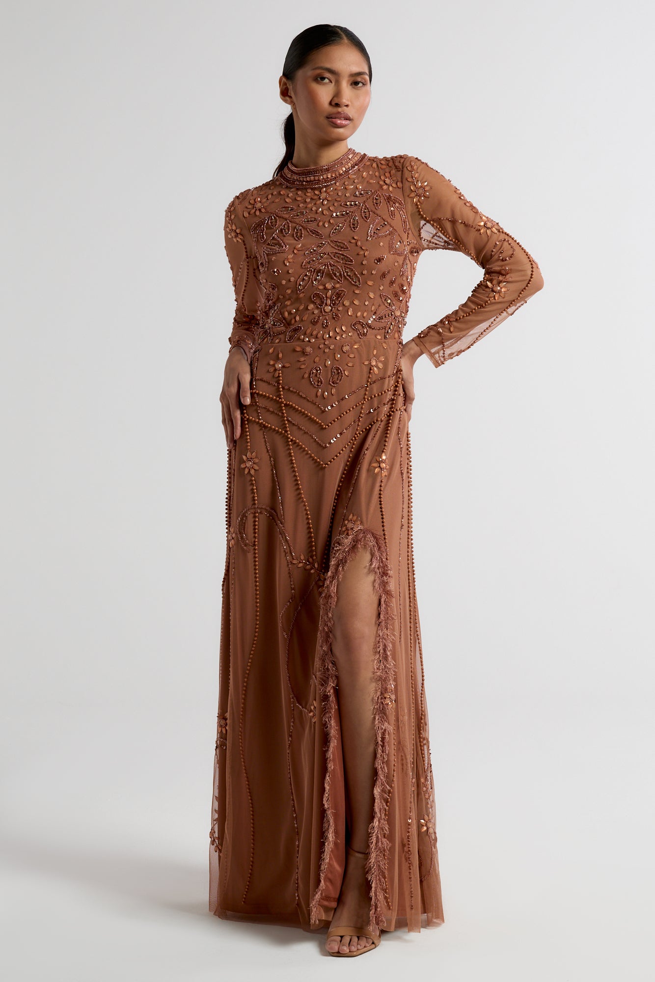 Solene bronze embellished maxi dress with high neckline, side split skirt, and open back, perfect for weddings, formal occasions, and evening events.