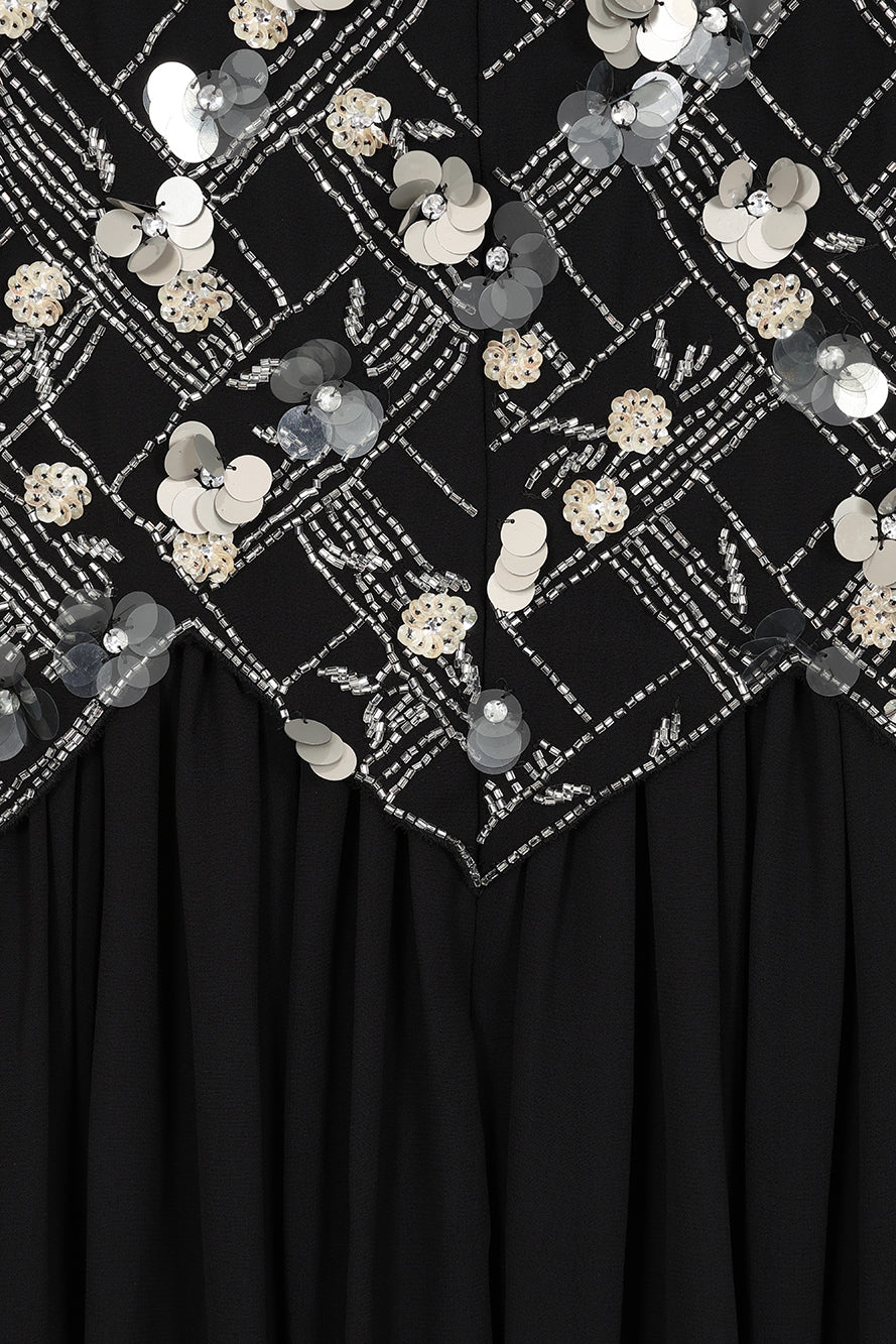 Una black embellished cape sleeve midi dress by Frock and Frill with silver bodice detailing, high neckline and flared skirt designed for elegant occasion wear styling