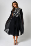 Una black embellished cape sleeve midi dress by Frock and Frill with silver bodice detailing, high neckline and flared skirt designed for elegant occasion wear styling