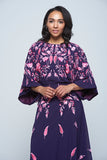 Viola Purple Maxi Dress with floral embroidery, long sleeves, and floor-length flowing silhouette, perfect for weddings and evening events.